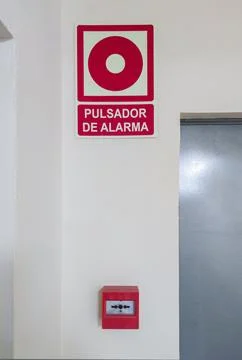 Emergency manual push button for fire alarms Stock Photos