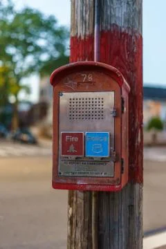 Emergency Reporting System box to notify the police and fire department n old Stock Photos