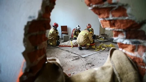Emergency rescue team in action during Vigorous Warrior Stock Footage 106953280