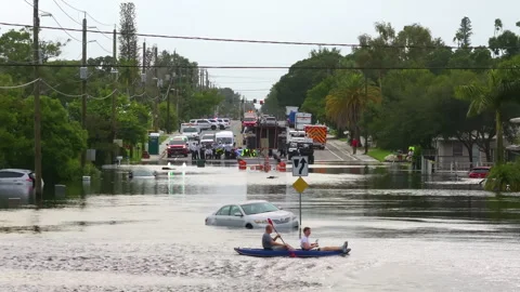 Emergency response after hurricane Debby flooding in Sarasota, Florida. Rescue Stock Footage 302850853