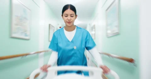 Emergency, running and nurse with bed in hospital for operation, icu or ER Stock Footage 340906547