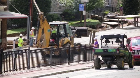 Emergency services at disaster site. Flood damage destroyed building foundation. Stock Footage 70538065