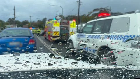 Emergency services work swiftly at the scene of a major two-vehicles Stockfoto's