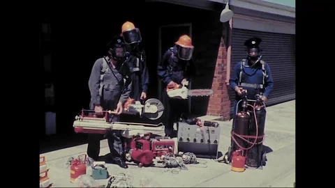 Emergency Services Workers Demonstrate Rescue Equipment, Australia, 1977 Stock Footage 339654224
