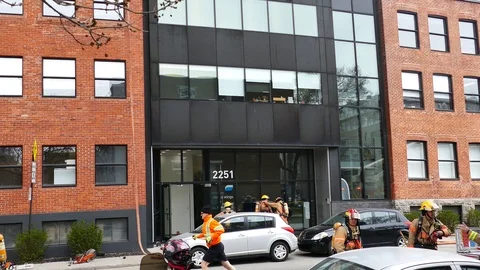 Emergency services working during structure fire intervention Stock Footage 114946274