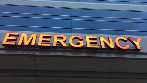 Emergency Sign in Red Lit Up Stockbeeldmateriaal 80093802