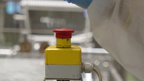 Emergency stop button forcefully pressed by fist, slow motion Stock Footage 346180457