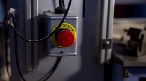 An emergency stop button on an industrial machine Stock Footage 47372776