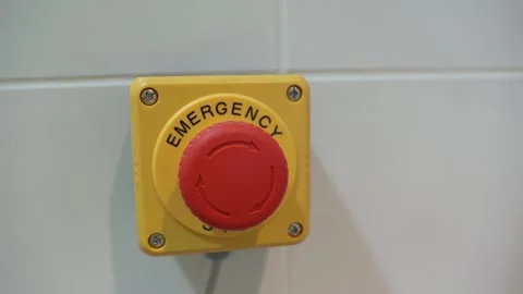 Emergency Stop Button on White Wall 스톡 동영상 315630815