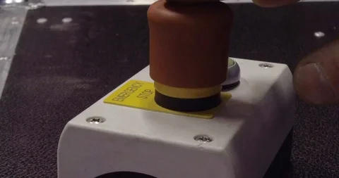 Emergency Stop. An engineer pressing eme... | Stock Video | Pond5