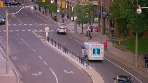 Emergency Vehicles Responding in Downtown Toronto Stock Footage 339630567