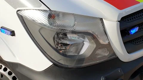 Emergency Warning headlights on an ambulance Stock Footage 132125029