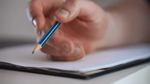 Emergency worker documents home health details carefully. Paramedic diligently Video stock 337548154