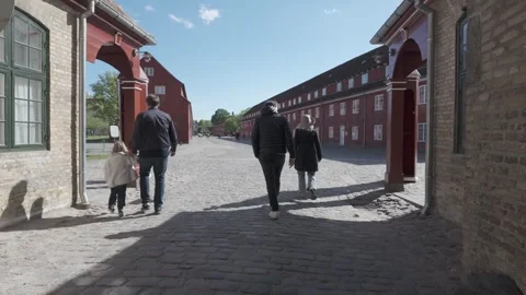 Emerging from the gate arch into the cobbled courtyard of Kastellet Stock Footage 341289094