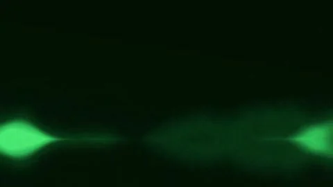 Emerging Green Light Blur in Dark Quiet Setting Stock Footage 327605462