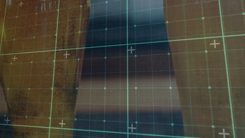 Emerging grid scanning amber glasses pulling back, tilting then stabilizing Stock Footage 314707383