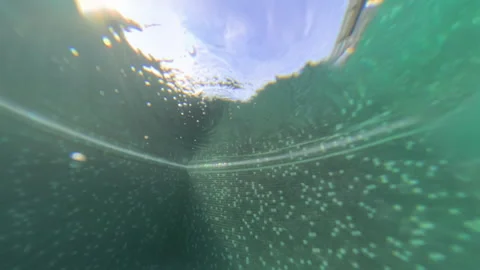 Emerging from infinity pool overlooking kuala lumpur skyline Video stock 309303154