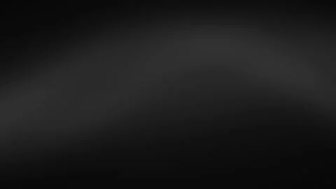 Emerging Light: A Subtle Glow on Black Background Stock Footage 324703029