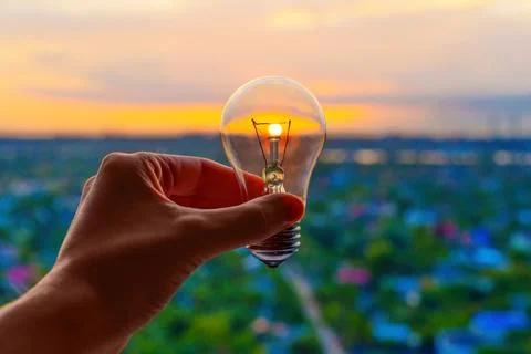 Emerging Technology: Sunrise through a Light Bulb Stockfoto's