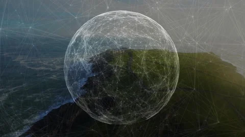 Emerging wireframe sphere intensifying lines and pulsing nodes above cliff Stock Footage 310668923
