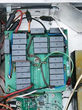 EMI Filter Board with Capacitors and Colored Wires. Stock Photos