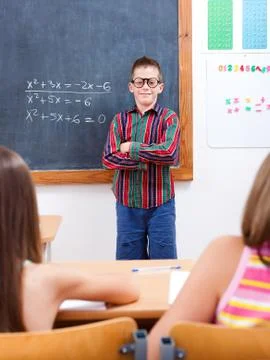 Eminent boy in front of class Stock Photos