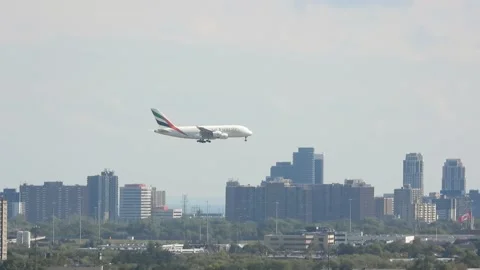 Emirate Airline plane landing on Toronto YYZ Pearson International Airport. Stock Footage 165257616