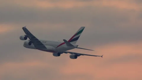 Emirates Airbus A380 Flying at Sunset Stock Footage 334367882