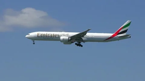 Emirates Airlines Boeing 777 airplane landing Stock Footage