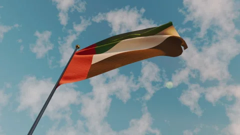 Emirates flag fluttering on a sunny day with clear sky Stock Footage 336200128