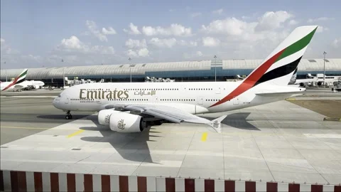 Emirates flight  airplane on runway flying moving for flight Dubai Stock Footage 242601650