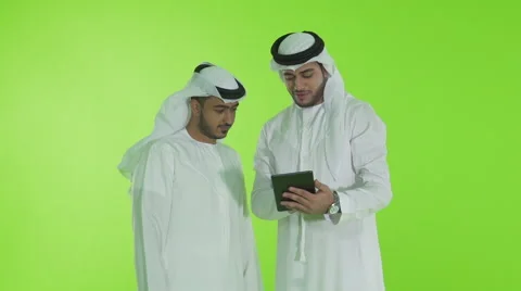 Emirati businessmen using digital tablet. Stock Footage 54479325