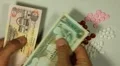 Emirati Dirham AED, Counting Drugs and Money, Health Care, Colorful Pills HD Footage