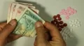 Emirati Dirham AED, Counting Drugs and Money, Health Care, Colorful Pills HD Footage