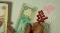 Emirati Dirham AED, Counting Drugs and Money, Health Care, Colorful Pills HD Footage