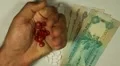 Emirati Dirham AED, Counting Drugs and Money, Health Care, Colorful Pills HD Footage