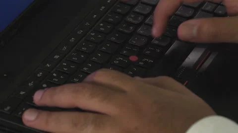 Emirati man typing on keyboard Stock Footage 55316312