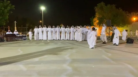 Emirati men dancing Stock Footage 120198435
