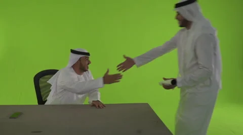 Emirati men shaking hands Stock Footage 55316535