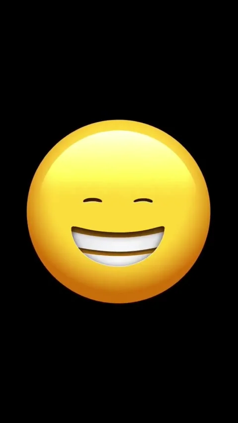 Emoji expression going from neutral to full cheerful smile on black backgroun Stock Footage 329406110