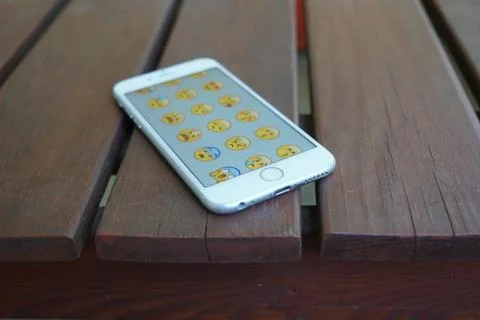 Emoticons on the screen of an Apple iphone Stock Photos