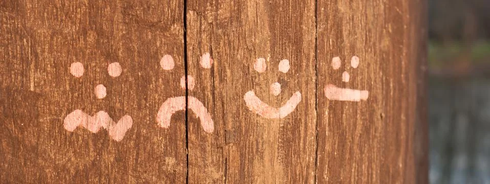 Emoticons at timber Stock Photos