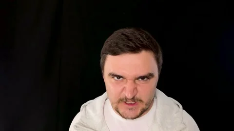 Emotion of absolute rage, anger and fury expressed by mad rampaging adult male Stock Footage 192057698