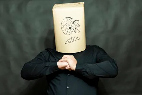 Emotion concept. The man is looking forward. Hands are fastened on the chest Stock-Fotos