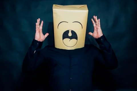 Emotion concept. The man is looking forward. Hands raised up. The man is yawning Stock Photos