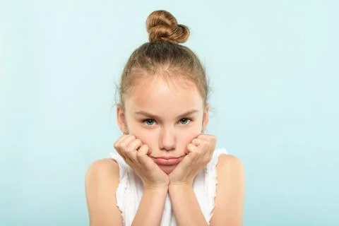 Emotion face grumpy pursed lips frowning child 스톡 사진