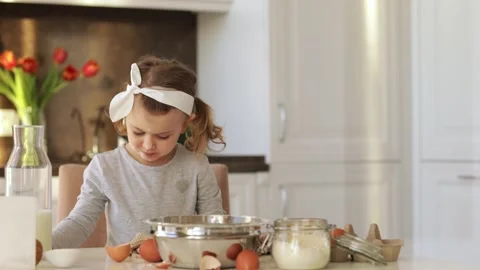 Emotional child cooking cake Easter Christmas party kitchen. Home bakery Stock Footage 161971657
