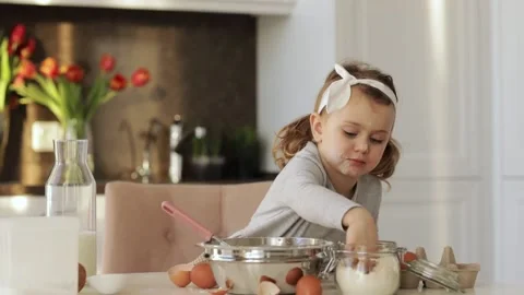 Emotional child cooking cake Easter Christmas party kitchen. Home bakery Stock Footage 161971660