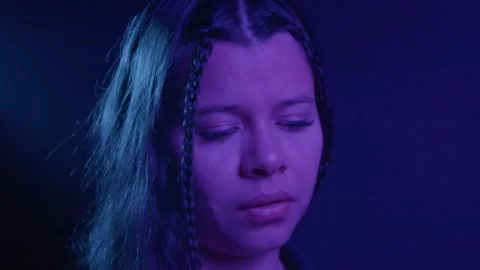 Emotional Close-Up Portrait with Dramatic Lighting Stock Footage 321203158