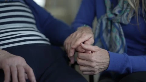 Emotional Connection and Support Between Elderly Woman and Her Daughter at Home Stock Footage 308801316